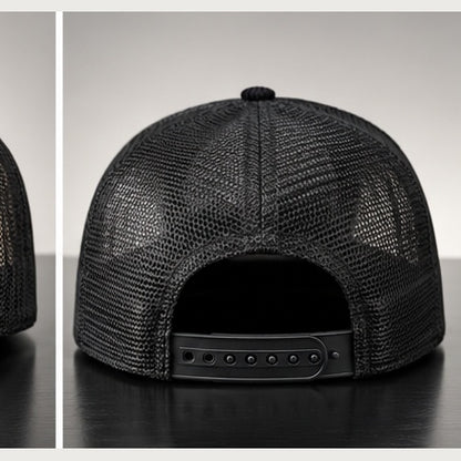 Rear view of black corduroy trucker snapback on a clean studio background