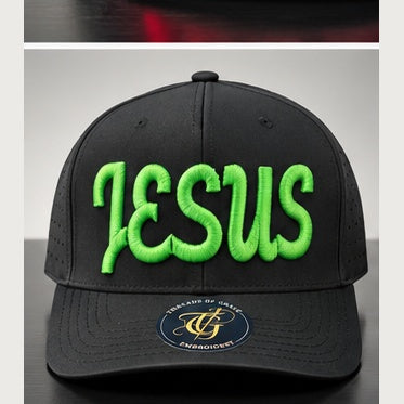 Black perforated snapback with green Jesus Script 3D puff embroidery on a clean studio background