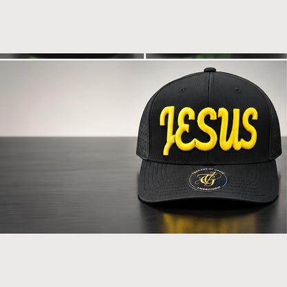 Black perforated snapback with yellow Jesus Script 3D puff embroidery on a clean studio background