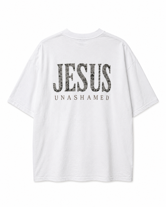 Back view of white AS Colour Heavy T Shirt with stonewashed JESUS UNASHAMED full back design on white background